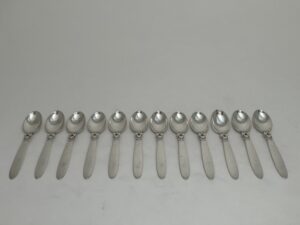 Zilver set van 12 koffielepels, georg Jensen,1933-1944, model cactus, Haarlemsche Zilversmedeij K.H.Schermerhorn, Haarlem